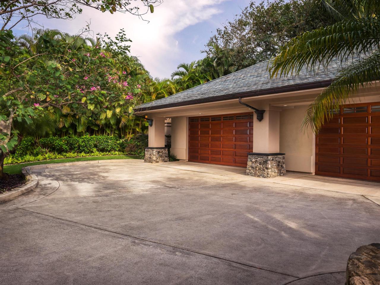 stamped surroundings the borders of a driveway in hawaii have a stamped concrete finish the